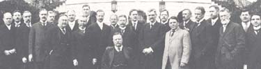 President Theodore Roosevelt, seated, and members of his Cabinet posing for a group photo in March 1909.